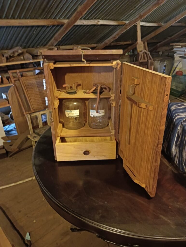 vintage Baxter Vacoliter glass 1V system in wooden box; distressed;