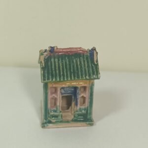 Tiny hand-painted ceramic house figurine