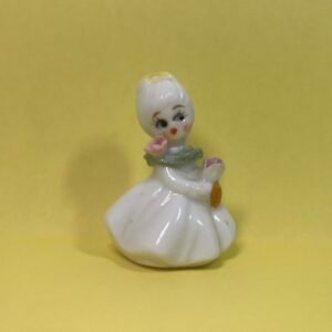 Napco Flower girl with yellow bow