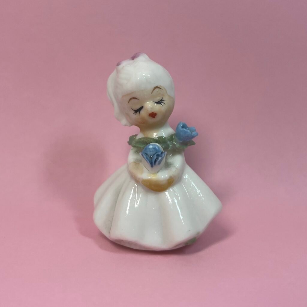 Napco-Style flower girl with pink bow