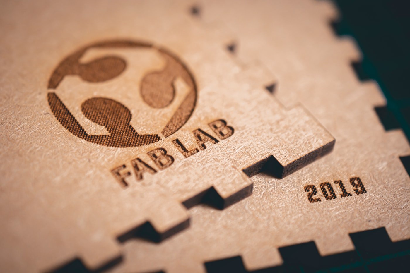 Detailed laser engraving on a wooden project